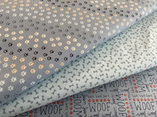 stacy iest hsu moda dog daze doggy puppy cotton fabric character fabric panel kennel bone woof bark paw print blue grey 2