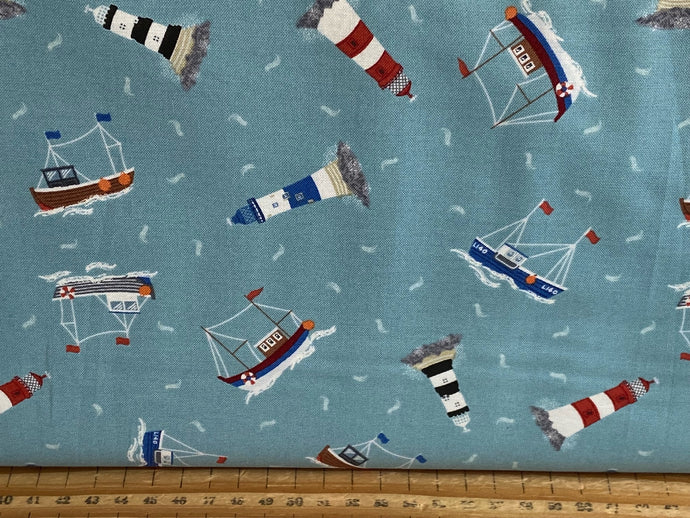 Lewis & Irene All Things Coastal Boats & Lighthouses seaside Sea Blue Green cotton Fabric Shack Malmesbury