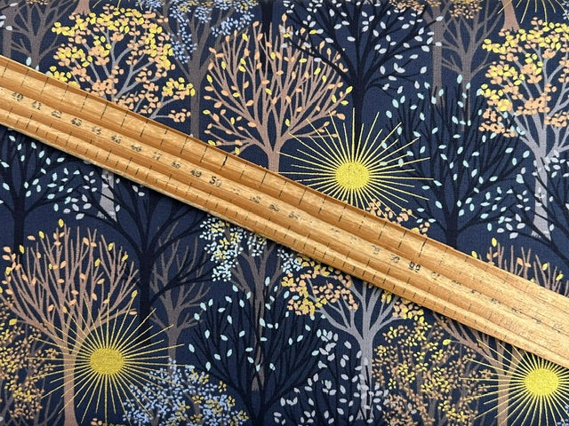 lewis & irene winter solstice stone henge trees sun star flowers metallic cotton fabric shack malmesbury trees on midnight blue