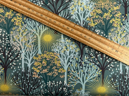 lewis & irene winter solstice stone henge trees sun star flowers metallic cotton fabric shack malmesbury trees on teal 
