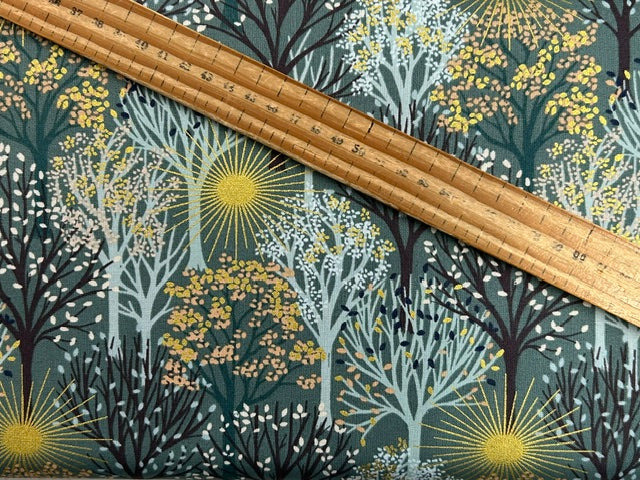 lewis & irene winter solstice stone henge trees sun star flowers metallic cotton fabric shack malmesbury trees on teal 