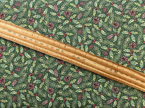susan wheeler design yuletide burrow pine fir cone green cotton fabric shack malmesbury