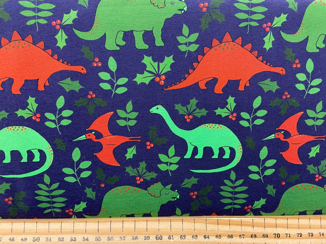 fabric shack sewing dressmaking sew organic jersey knit christmas cleo stretch  dinosaurs brontosaurus triceratops pterodactyl holiday holly blue