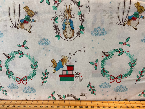fabric shack sewing quilting sew fat quarter cotton patchwork quilt beatrix potter peter rabbit christmas holidays mrs rabbit presents wreath sledging gifts