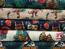 jurassic park opulent jungle cotton fabric dinosaurs dinosauria badges cream fabric shack malmesbury