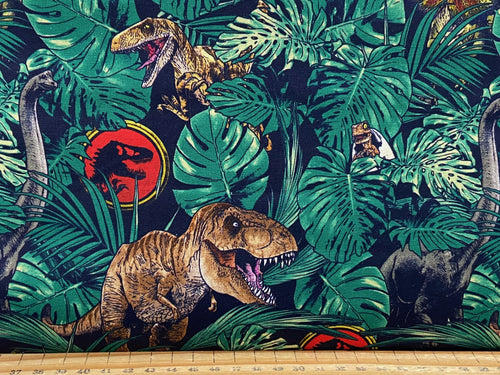 jurassic park opulent jungle cotton fabric dinosaurs rapter tyranosaurus rex dark blue fabric shack malmesbury