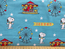 schultz snoopy circus cotton fabric shack malmesbury ferris wheel amusement park fair turquoise blue charlie brown woodstock peppermint patty linus joe cool